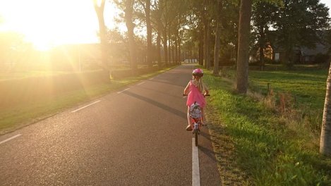 little girl riding bike